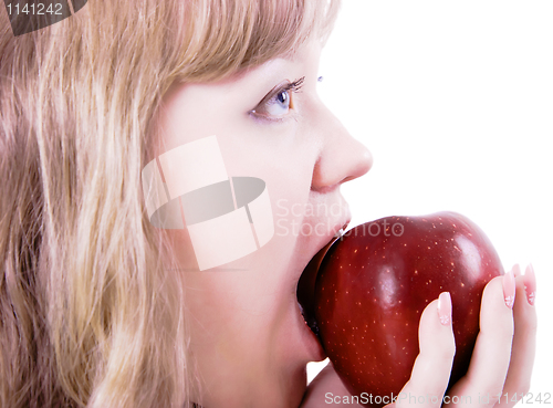 Image of girl biting the apple