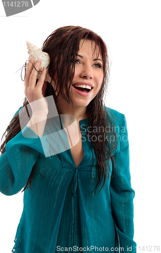 Image of Beautiful woman with seashell