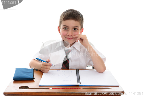Image of School boy student at desk
