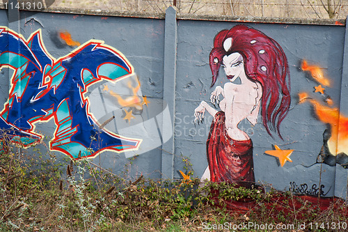 Image of Naked woman on a graffiti