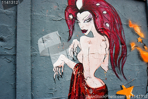 Image of Disturbing naked woman on a graffiti