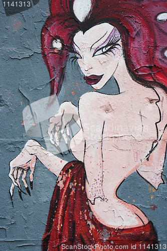 Image of Naked woman on a graffiti