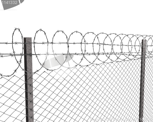 Image of Chainlink fence with barbed wire on top 