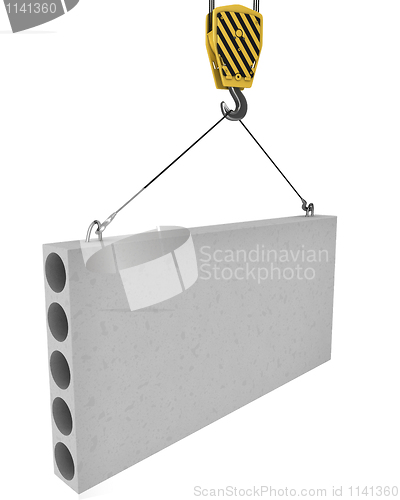 Image of Crane hook lifts up concrete plate isolated