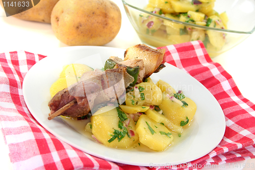 Image of Shashlik skewer with potato salad