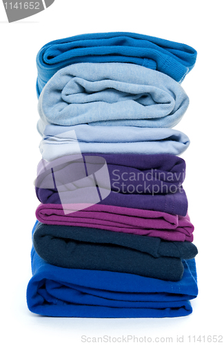 Image of Pile of blue and purple folded clothes