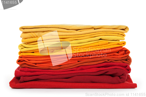 Image of Red and yellow folded clothes