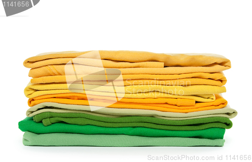 Image of Green and yellow folded clothes