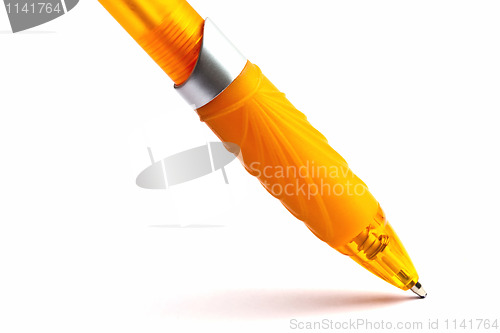 Image of Yellow pen closeup on white 