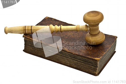 Image of Old book and gavel isolated on white background