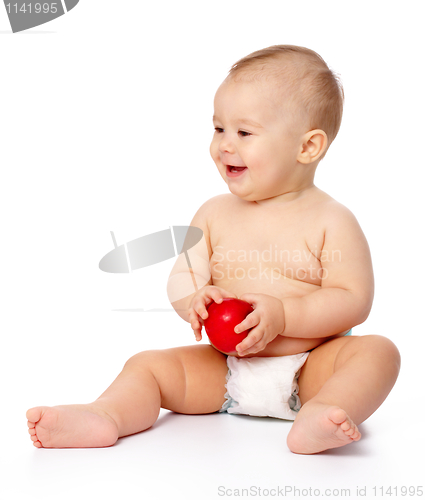 Image of Little child with apple