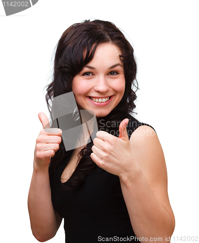 Image of Young woman showing thumb up gesture