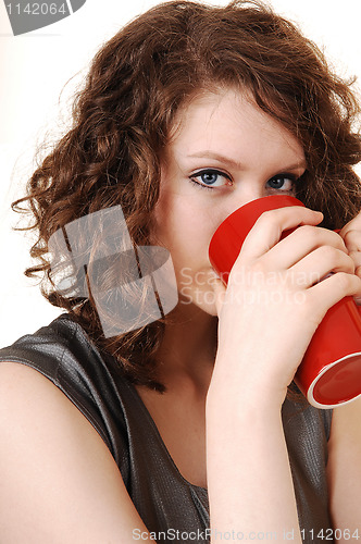 Image of Girl thinking coffee.