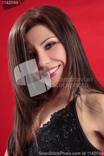 Image of Smiling woman long lustrous hair
