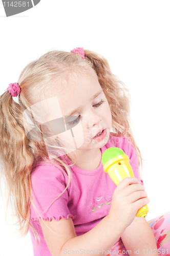 Image of Little cute girl in studio