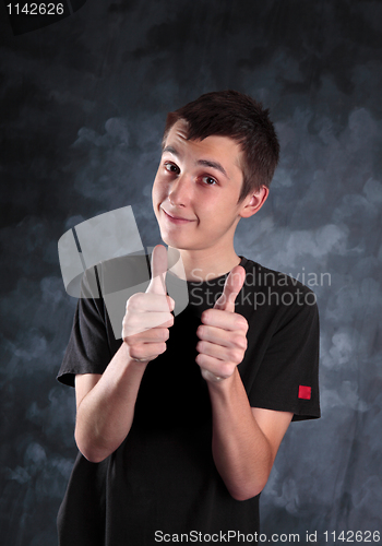 Image of Teen boy thumbs up