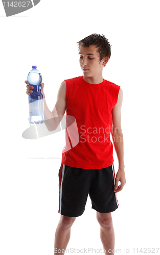 Image of Teenager holding large bottle of water