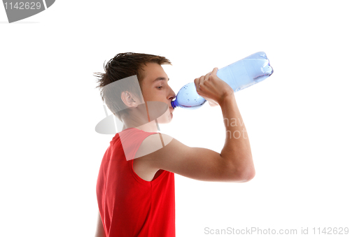 Image of Boy teen drinking bottled water