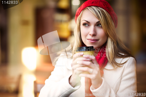 Image of Woman drinking coffee