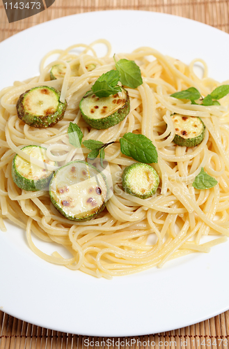 Image of Courgettes with spaghetti and mint vertical