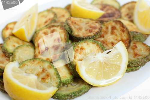 Image of Fried courgette rings and lemon macro