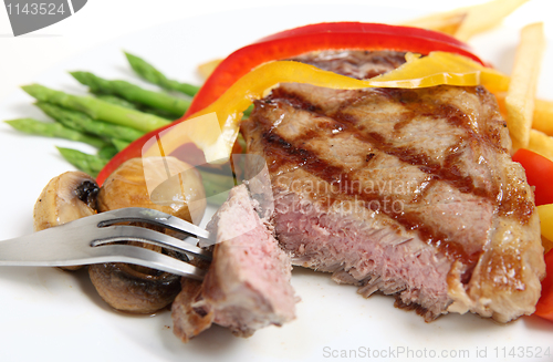 Image of Veal sirloin steak meal cut open
