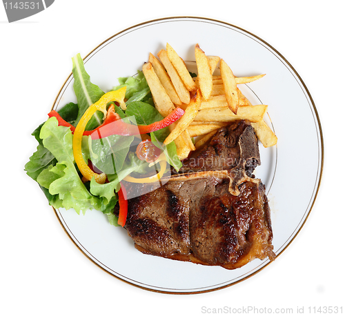 Image of Seared T-bone steak meal from above