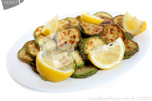 Image of Courgette rings and lemon wedges