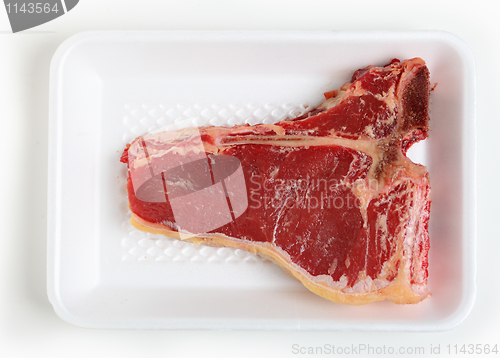 Image of T-bone steak on a tray