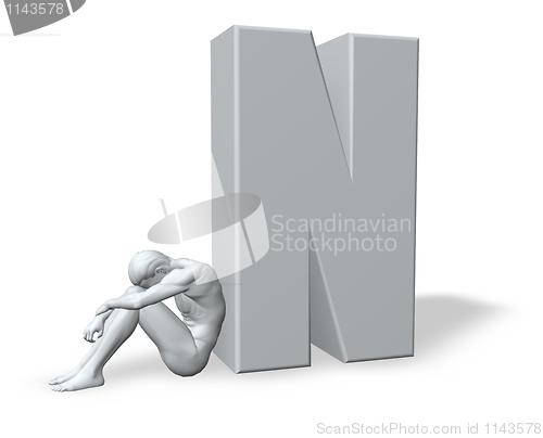 Image of sitting man leans on uppercase letter n