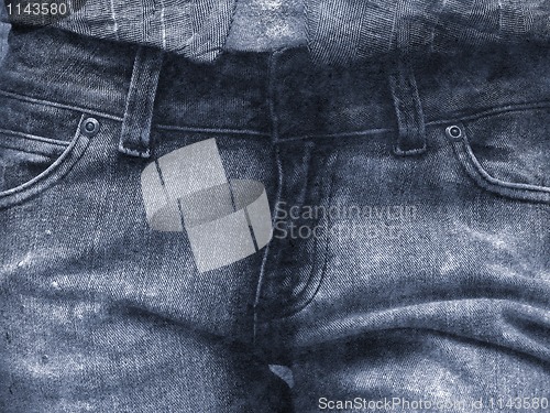 Image of Old dirty blue jeans