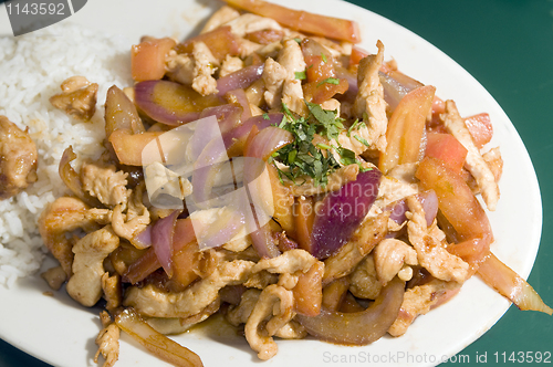 Image of chicken pollo saltado traditional Peruvian food