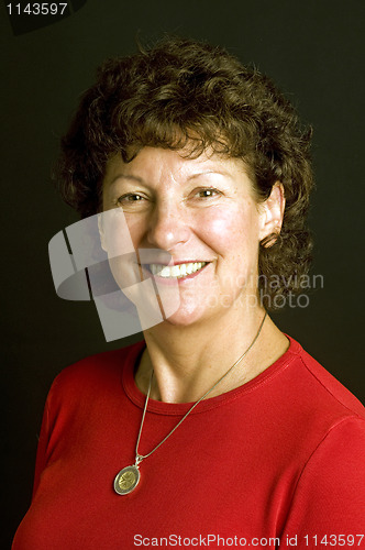 Image of attractive middle age senior woman studio portrait Euro coin nec