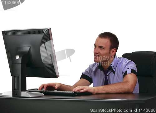 Image of Young man on a computer