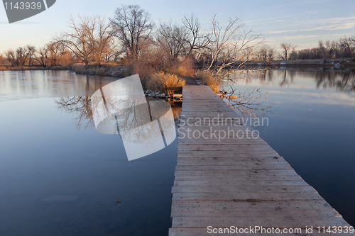 Image of boardwalk pathway over lake