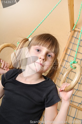 Image of child at her home sports equipment