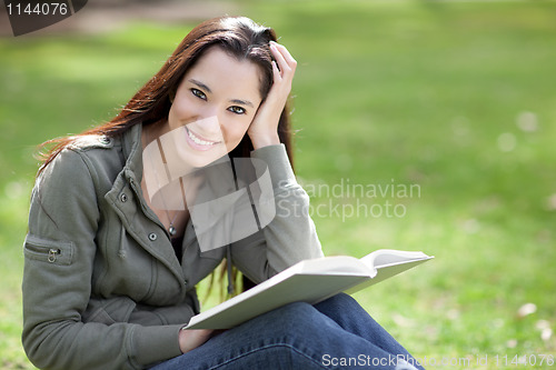 Image of Ethnic college student studying