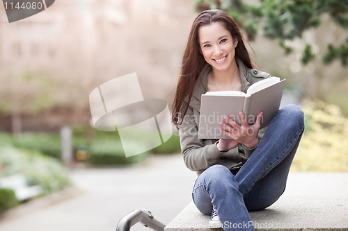 Image of Ethnic college student studying