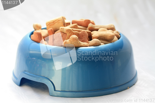 Image of Dog bowl with dog cookies