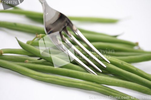 Image of haricots verts - common green beans on a fork