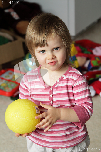 Image of Little girl with a ball