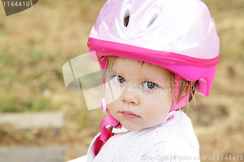 Image of Toddler girl with helmet