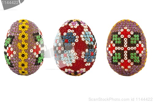 Image of  easter eggs decorated with beads