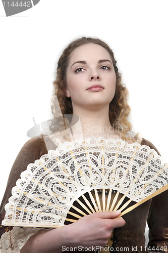 Image of Beauty with fan in medieval dress