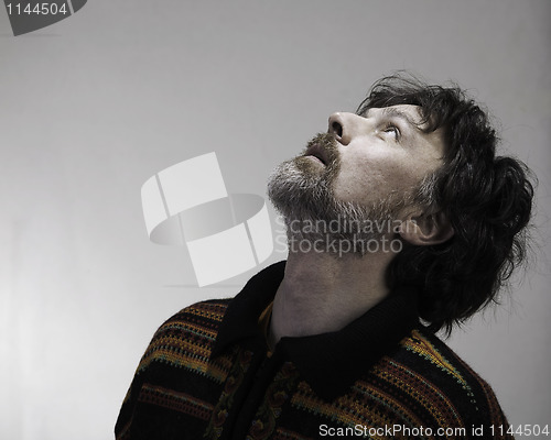 Image of man looking to the light