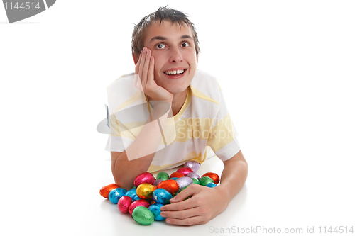 Image of Boy with easter eggs and looking up