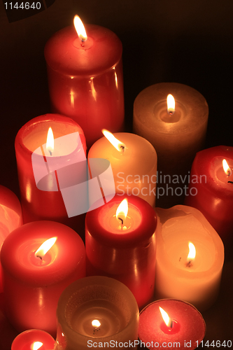 Image of Group of burning candles