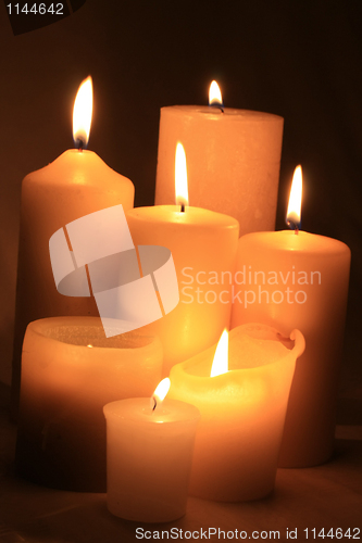 Image of group of ivory white candles