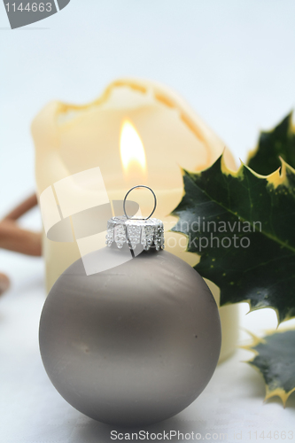 Image of candle and christmas ornament