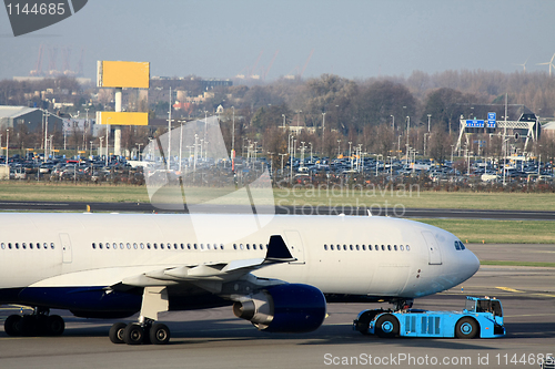 Image of Airplane pulled back from the gate